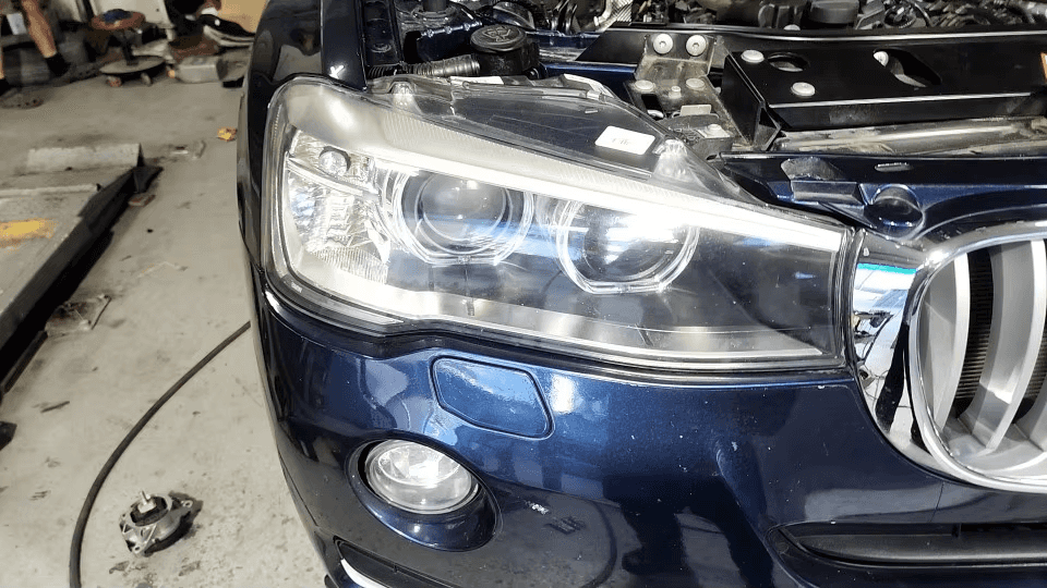 Customer install: headlamp unit being fitted